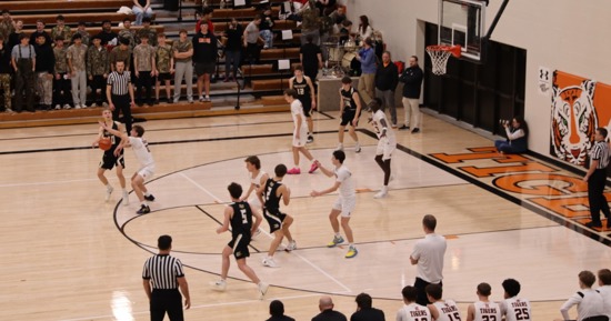 Northwest Boys Run Away From Hastings, 62-46